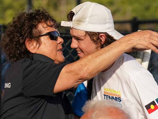 Coffs Harbour's Charlie Pade won the 2023 Under 18 years boys single title at the National Indigenous Tennis Carnival in Darwin. He is seen here receiving his trophy from legend Evonne Goolagong Cawley. Picture: Tennis Australia