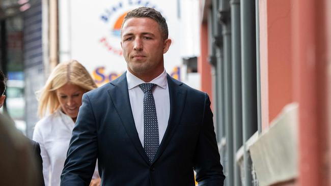 Sam Burgess arriving at court this morning with his mother Julie following close behind. Picture: Bianca De Marchi