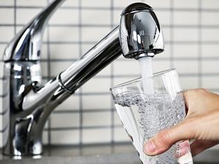 Filling glass of tap water