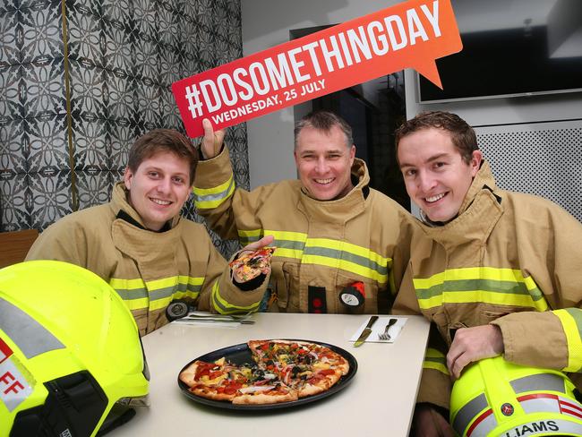 Club Toukley put on free pizza for first repsonders - .Firefighter Cale Henly, Captain Steve McKay and Firefighter Ben Williams from Toukley Fire Station Picture: AAPe/Sue Graham.