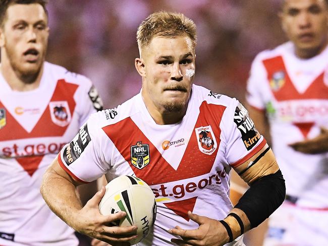 WOLLONGONG, AUSTRALIA - APRIL 13:  Jack De Belin of the Dragons runs the ball during the round six NRL match between the St George Illawarra Dragons and the Cronulla Sharks at WIN Stadium on April 13, 2018 in Wollongong, Australia.  (Photo by Brett Hemmings/Getty Images)