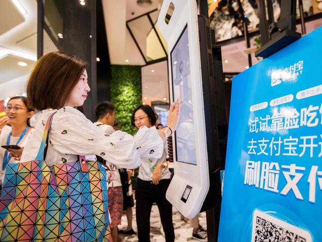 Smile to Pay is being trialled at a KFC fast food restaurant in Hangzhou in China. Picture: AFP