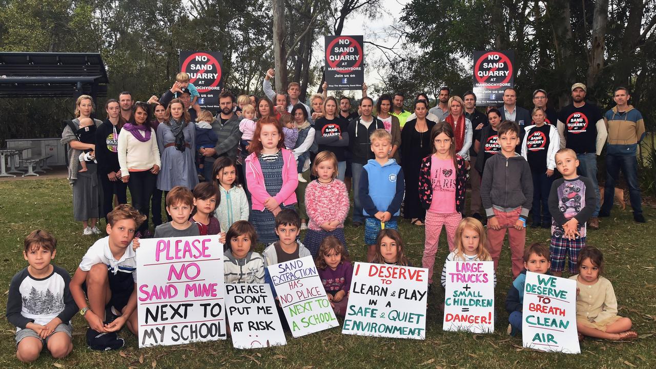 Montessori parents gather to protest about the proposed sand mine for Forest Glen.