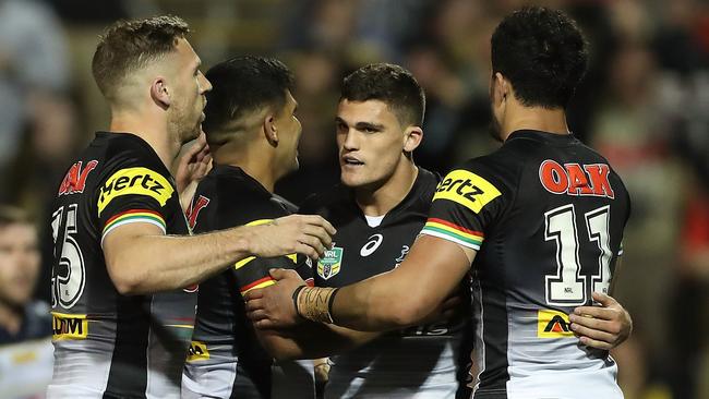 Nathan Cleary of the Panthers celebrates scoring a try.