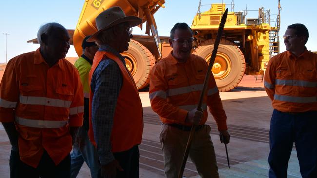 WA Premier Mark McGowan appeared mighty chuffed by his gifts from traditional owners, best of all a 'punishment stick'.