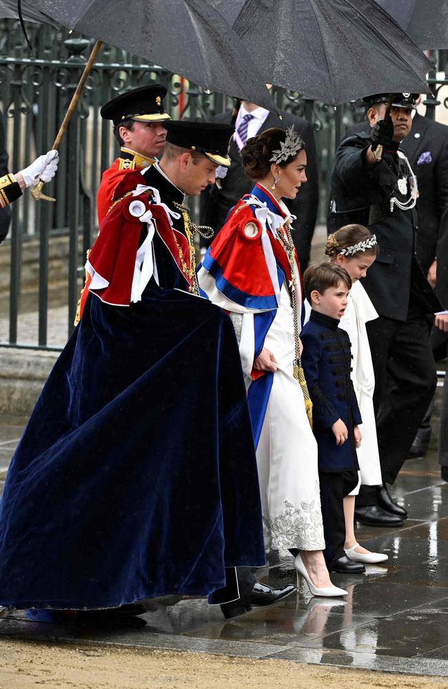 Prince William and Princess Catherine arrive with their children. Picture: AFP