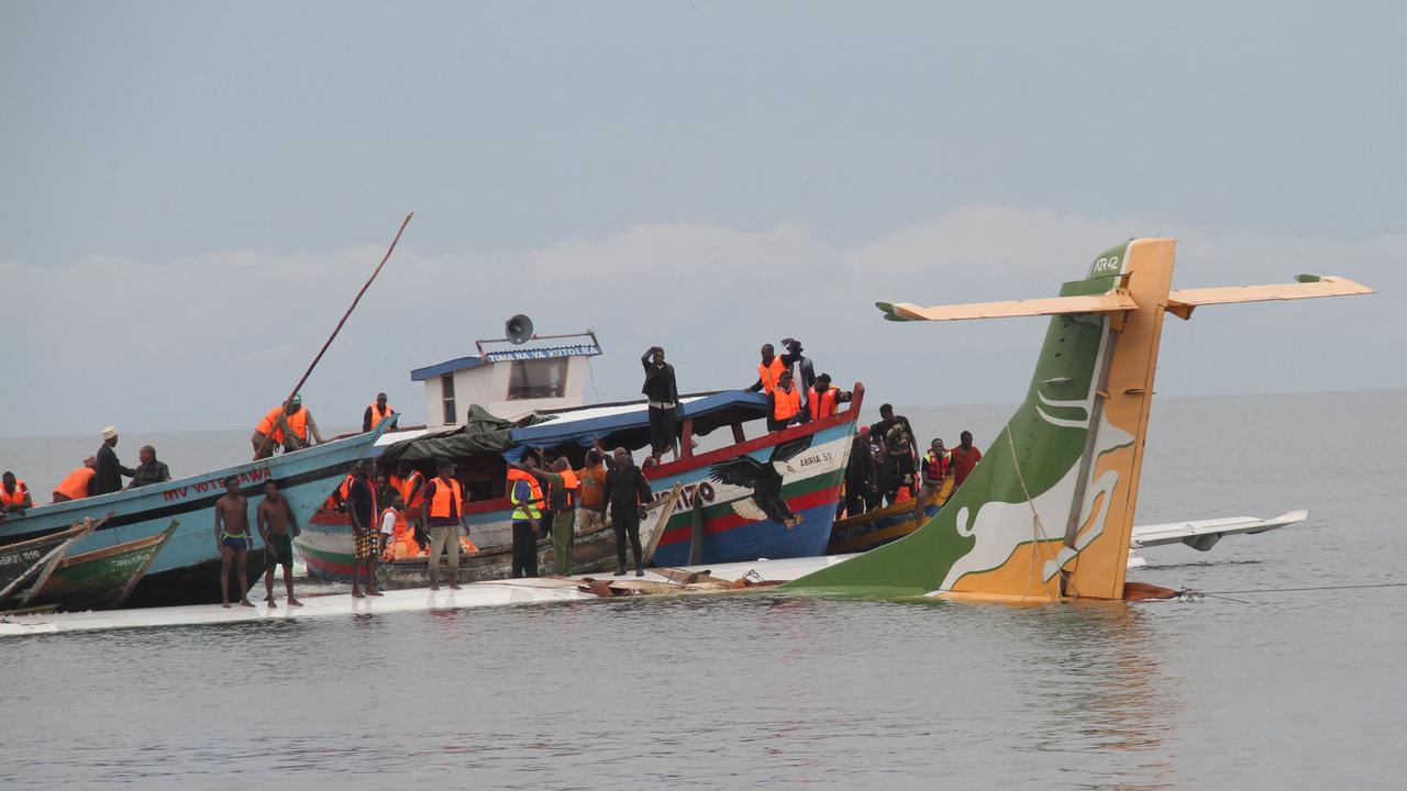 Rescuers search for survivors after a Precision Air flight that was carrying 43 passengers plunged into Lake Victoria. Picture: Sitide Protase/AFP