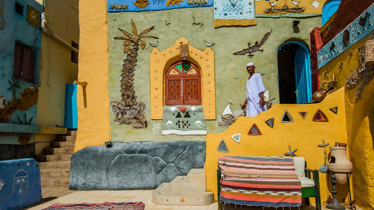 <h2>7. Visit a Nubian village</h2><p>Aswan is home to a large Nubian population, an ethnic group Indigenous to Northern Sudan and Southern Egypt, and exploring an authentic village should be at the top of your list. &ldquo;I love walking around Gharb Soheil, a Nubian village on the west bank of the Nile from Aswan. The buildings are painted with murals or colourful architectural details &ndash; it&rsquo;s pure eye candy,&rdquo; says Keith.</p><p>Some tour operators, such as <a href="https://www.exploreworldwide.com.au/" target="_blank" rel="noopener">Explore Worldwide</a>, will take you right into a home. &ldquo;The experience is magical,&rdquo; says Grove. &ldquo;You have dinner in a house, reached by sandy paths, and sit in an open courtyard where you eat under the stars. It doesn&rsquo;t feel like a tourist experience.&rdquo;</p>