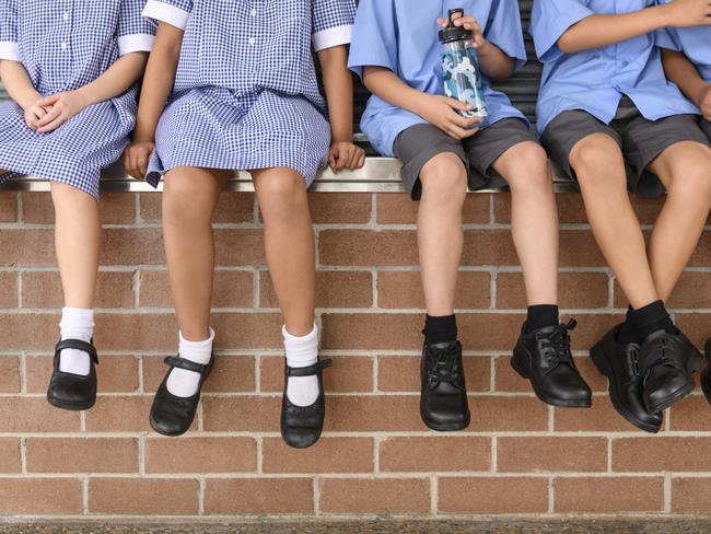 Should girls and boys adhere to the same dress codes?