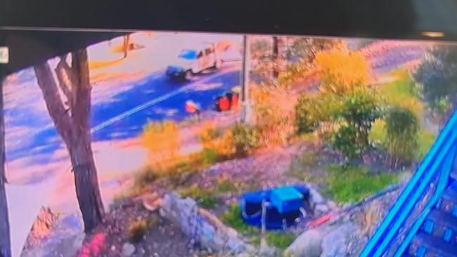 CCTV allegedly showing what witnesses said was Nikki Teo’s car travelling on the wrong side of Settlers Rd in Wiseman's Ferry before she crashes into Ross’s motorbike.