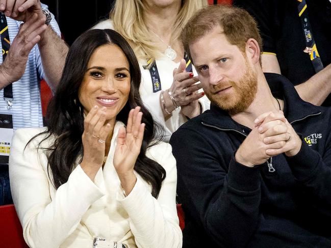 Prince Harry and Meghan Markle’s charity tour of the UK and Europe has royal experts saying it is a bid to salvage their popularity with the public. Picture: AFP