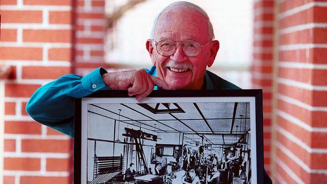 Roy Buckle from Hornsby with a photo of the Advocate's printing office where he was the first apprentice in 1928. Picture: Troy Snook