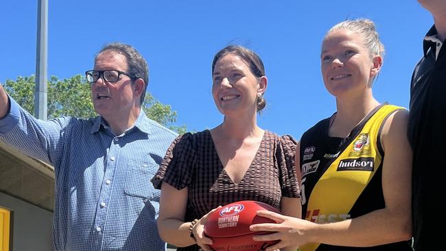 Solomon MP Luke Gosling, AFL NT Facilities and Government Partnerships Manager NT Katrina Kawaljenko, Nightcliff Tigers player Hayley Jones and Councillor Ed Smelt at Nightcliff Oval.