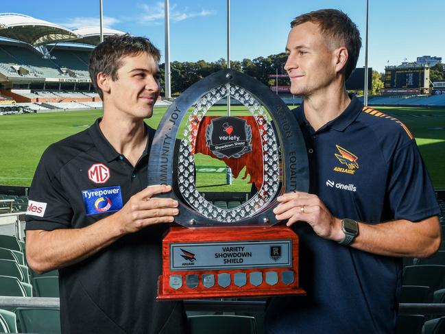 Connor Rozee and Jordan Dawson holding the Variety Shield ahead of this week’s Showdown. Picture: Mark Brake/Getty Images.