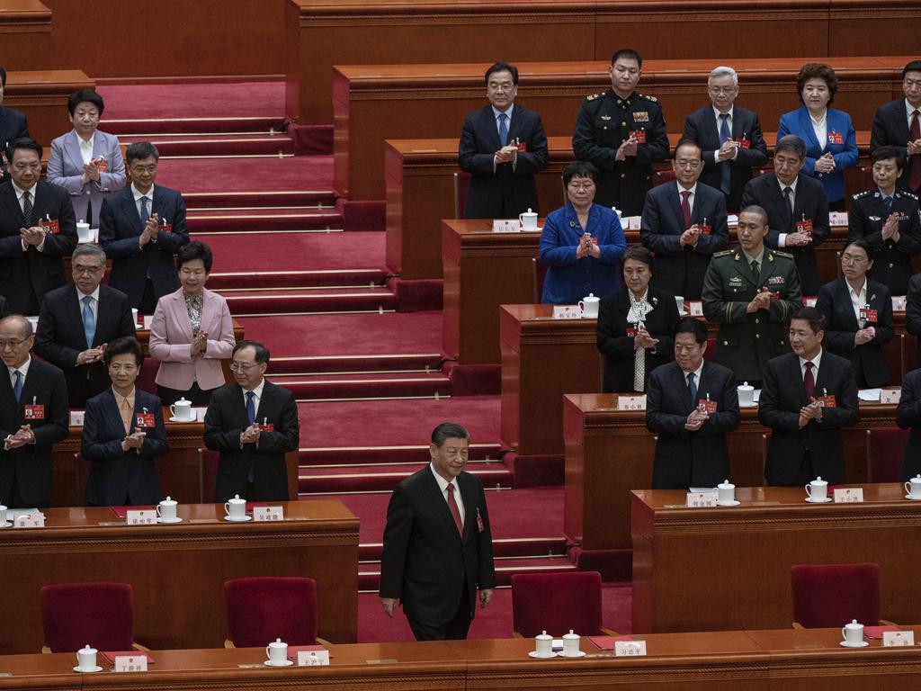 President Xi Jinping, centre, is applauded during National People’s Congress at the Great Hall of the People on March 11, 2024 in Beijing, China. Picture: Kevin Frayer/Getty Images