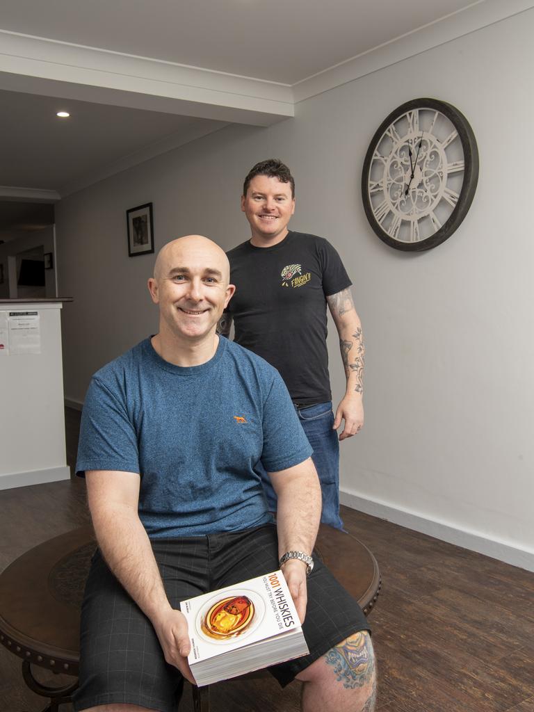 Ben Smith (seated) and Scott Hornery have opened Whisky Time Tattoo in Ruthven St. Wednesday, July 21, 2021. Picture: Nev Madsen.