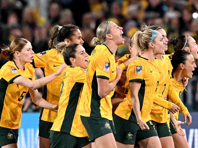 SYDNEY, AUSTRALIA - JULY 20: Steph Catley of the Matildas celebrates with  team mates after scoring a goal during the FIFA Women's World Cup Australia & New Zealand 2023 Group B match between Australia and Ireland at Stadium Australia on July 20, 2023 in Sydney, Australia. (Photo by Bradley Kanaris/Getty Images)