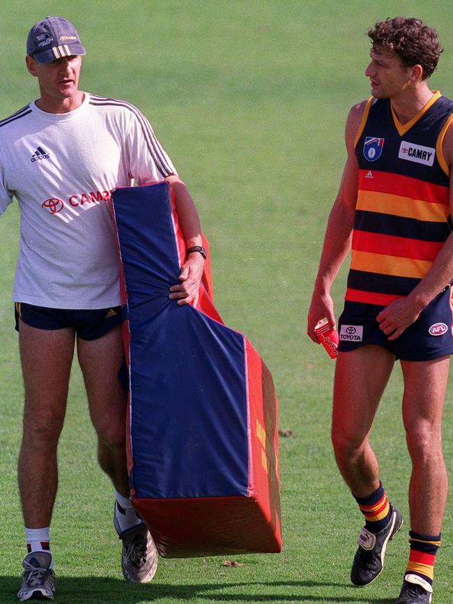 Mark Mickan, left, during his time as an assistant coach at the Adelaide Crows in 2000.