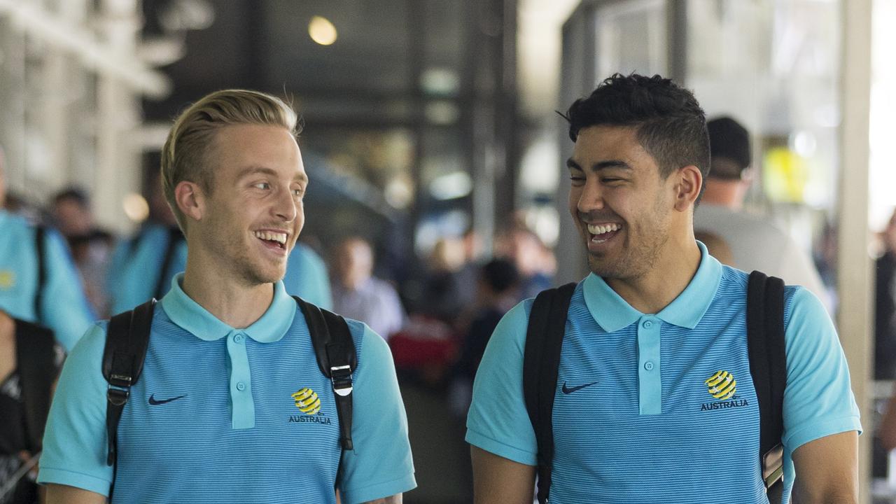 Socceroos players Massimo Luongo (right) and James Jeggo arrive with team at Sydney Airport  ahead of the second-leg of their 2018 FIFA World Cup Intercontinental Play-off against Honduras in Sydney, Sunday, November 12, 2017. A win on Wednesday will propel the Caltex Socceroos to the 2018 FIFA World Cup in Russia. (AAP Image/ Craig Golding) NO ARCHIVING