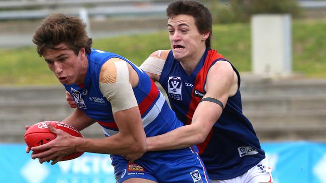 Cameron Holdsworth lays a tackle during his days at Coburg. Picture: Hamish Blair