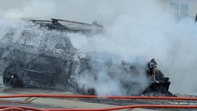 A car has caught on fire on Church St in Cowes.