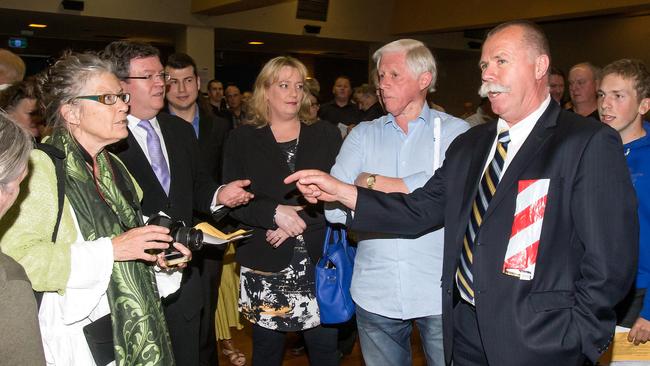 Frank McGuire, Ros Spence, Jack Ogilvie and Jack Medcraft during a heated discussion.