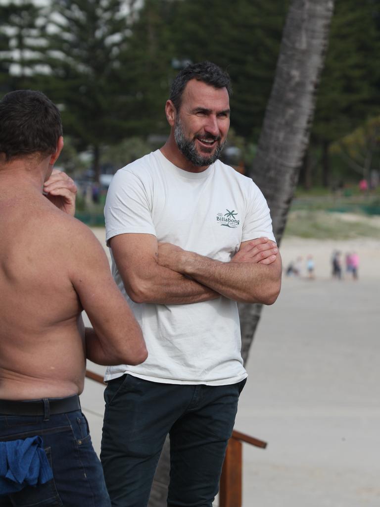 Former pro surfer and World Champion Joel Parkinson watching on as surfers take on near perfect waves at Snapper Rocks. Picture: Mike Batterham