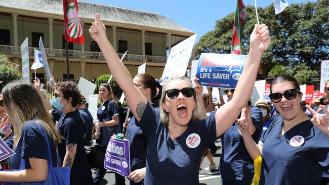 SYDNEY, AUSTRALIA - NewsWire Photos NOVEMBER 23, 2022: Nurses and Midwives, held their fourth strike today and marched from Hyde Park and along Macquarie Street. Picture: NCA NewsWire / David Swift