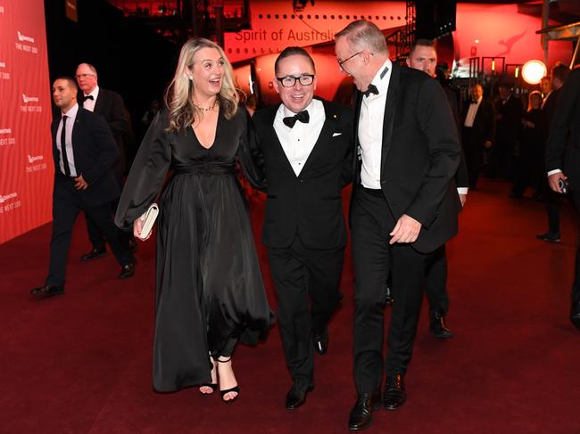 Jodie Haydon, Alan Joyce and Prime Minister Anthony Albanese at the Qantas 100th Gala Dinner at hangar 96 at Sydney's International Airport on March 31, 2023. Picture: James D. Morgan/Getty Images.