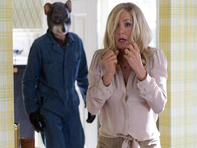 Masked men ... invade a home to stage a kidnapping in Life of Crime.