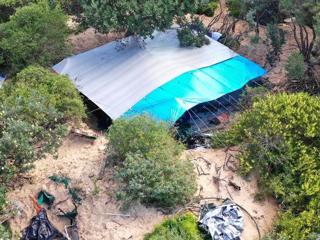 A makeshift campsite, photographed in August 2023, set up by homeless people in the sand dunes at Dee Why Beach. Picture: Manly Daily