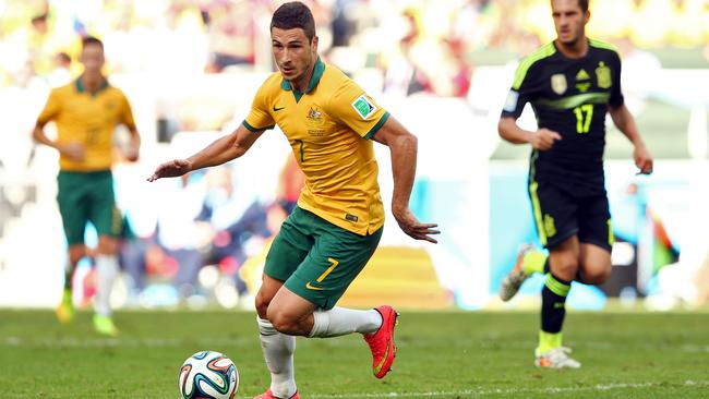 CURITIBA, BRAZIL - JUNE 23: Mathew Leckie of Australia controls the ball during the 2014 FIFA World Cup Brazil Group B match between Australia and Spain at Arena da Baixada on June 23, 2014 in Curitiba, Brazil. (Photo by Quinn Rooney/Getty Images)