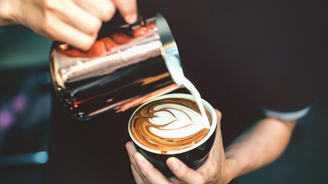 A barista making a coffee in cafe,Photo -  istockEscape 10 July 2022doc holiday