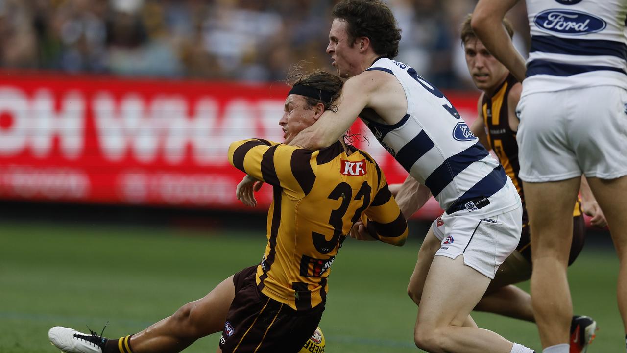 Jack Ginnivan of the Hawks gets taken high but doesn’t receive a free kick. Pic: Michael Klein