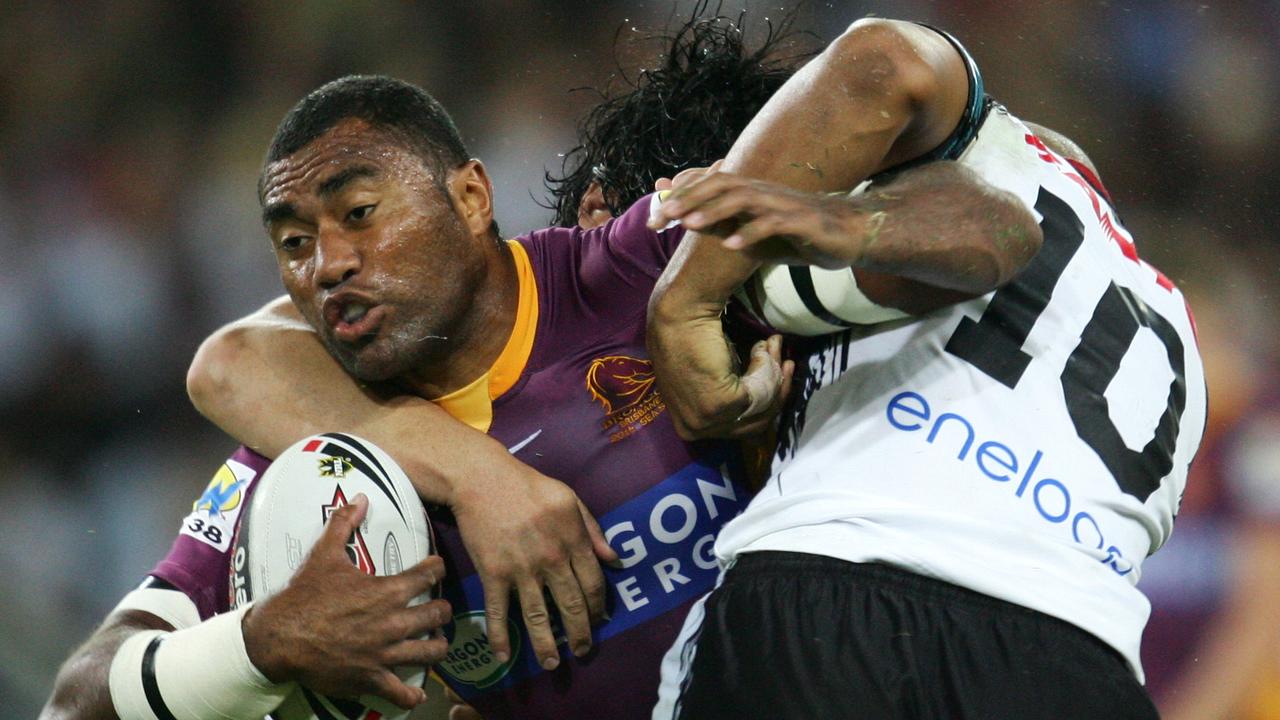 Petero Civoniceva of Brisbane tackled by Frank Puletua of Penrith during Brisbane Broncos vs Penrith Panthers @ Suncorp Stadium.
