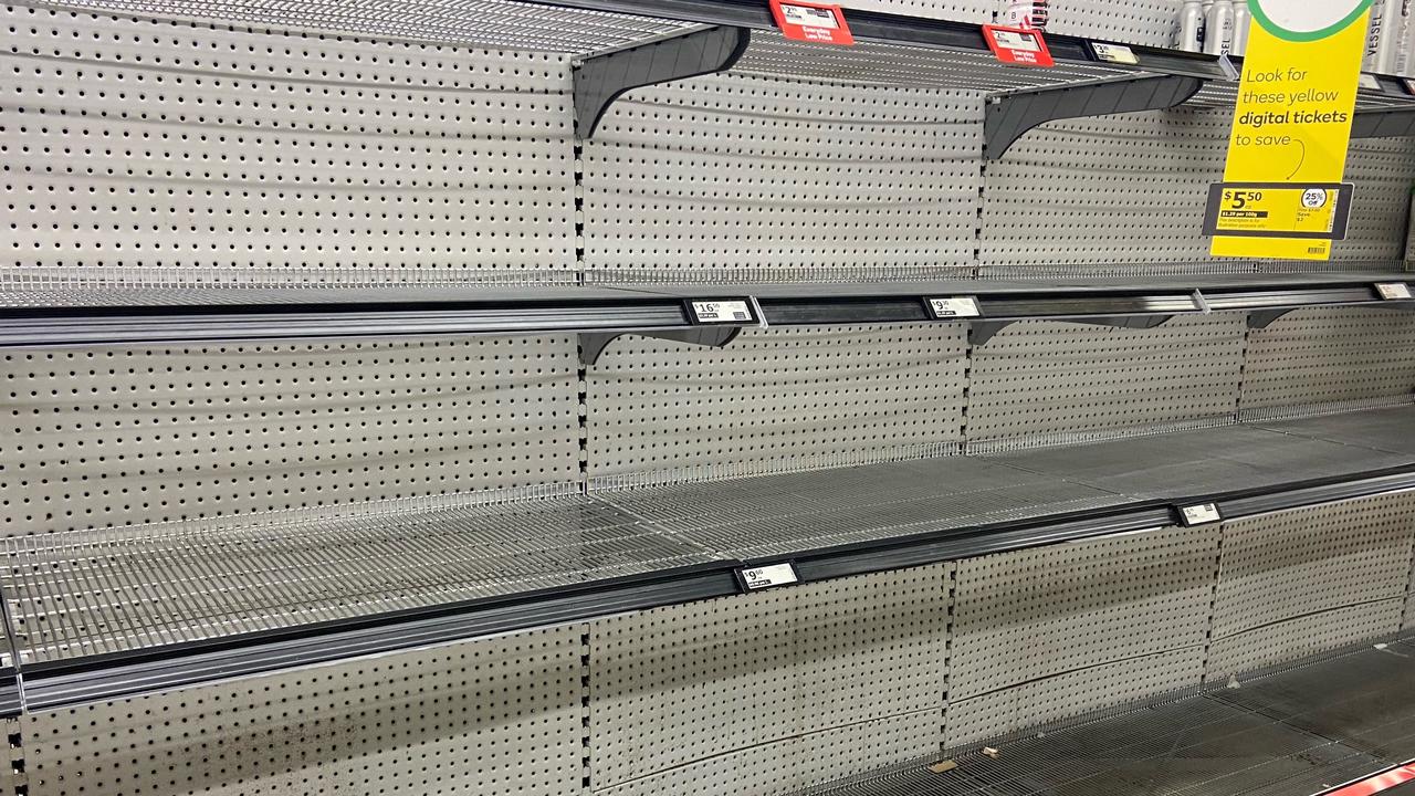 Cyclone panic buying explodes as supermarket shelves stripped bare