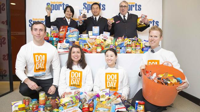 Bankstown Salvation Army officers and Bankstown Sports Club staff show their support for DoSomethingDay. Picture: Melvyn Knipe