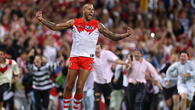 Lance Franklin celebrates kicking his 1000th AFL goal in round two against the Geelong Cats at the Sydney Cricket Ground in March