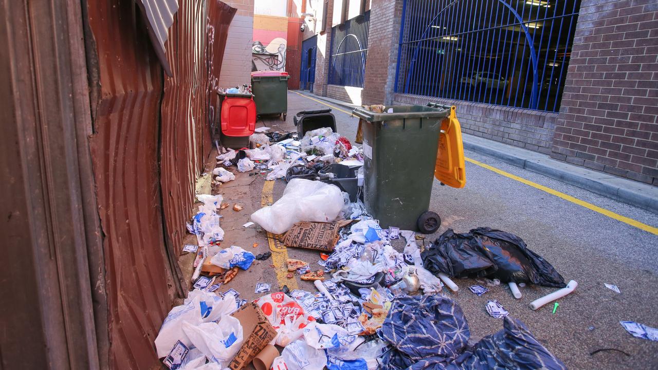 The laneway behind the Dog and Duck in Hindley St is often littered with rubbish. Picture: Brett Hartwig