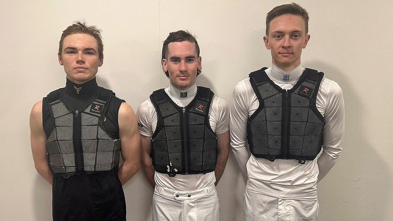 (From left to right) Jockeys Jasper Franklin, Tyler Schiller and Dylan Gibbons in their vests.