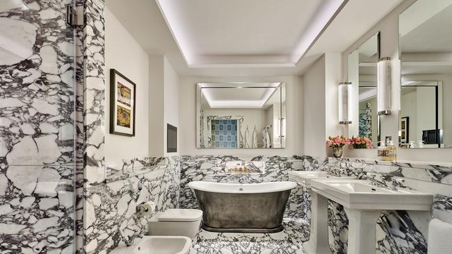 The Songbird Suite includes a stunning marble bathroom.