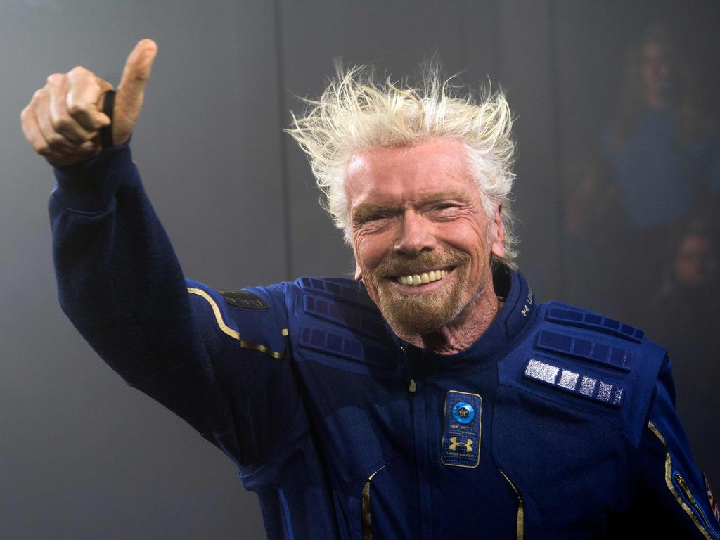 Virgin Galactic Founder Sir Richard Branson demonstrates a spacewear system. Picture: Don Emmert/AFP.