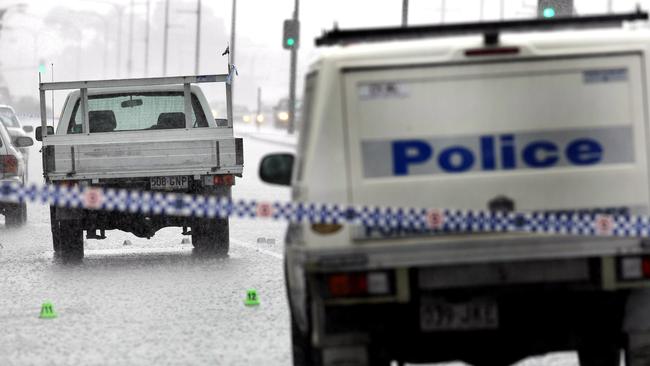 Police on scene after the Omega Ruston shooting on the Gold Coast Highway at Burleigh Heads.