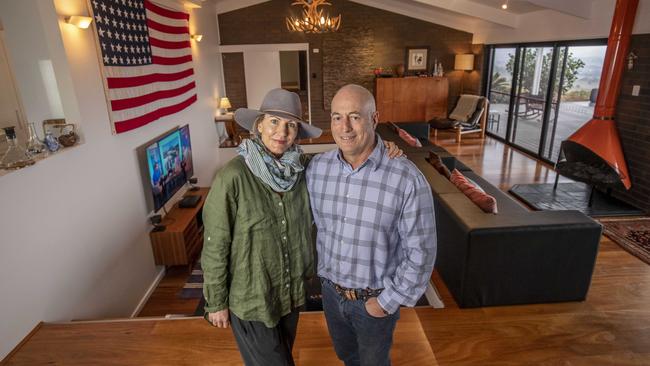 The Merlos in the sunken livingroom. Picture: Glenn Hunt