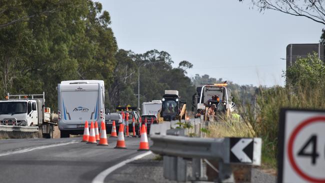 The Bruce Highway reopened to a single lane of traffic as work continued to clear and repair the road where the crash happened near Bajool. Photos: Geordi Offord