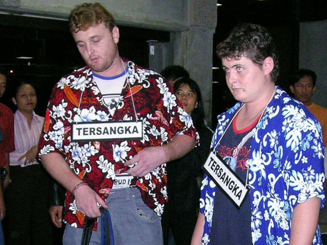 Martin Stephens and Renae Lawrence wore signs marked suspect in a 2005 re-enactment of their heroin smuggling attempt. Picture: Lukman S Bintoro