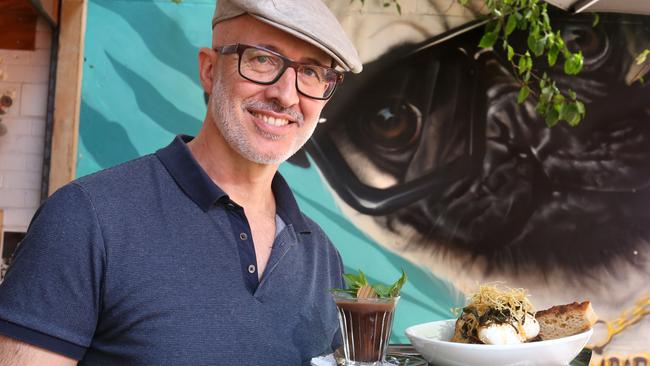 Circa Espresso owner Aykut Sayan with the cafe’s signature Ottoman eggs. Picture: Robert Pozo