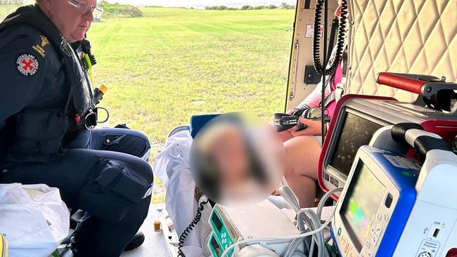 In April 2023 the Bundaberg RACQ LifeFlight Rescue helicopter crew airlifted a primary school-aged girl to hospital, after she was bitten by a dingo at K'gari (Fraser Island). Picture: Supplied.