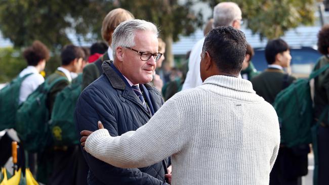 Former Trinity Grammar headmaster Dr Michael Davies wishes students and parents well outside the school after he announced his resignation. Picture: Aaron Francis