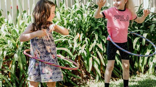 Grand Central is hosting a School Camp these school holidays. Amelie Fawcett and Audrey Thompson enjoying hula hooping outdoors thanks to Rebel.